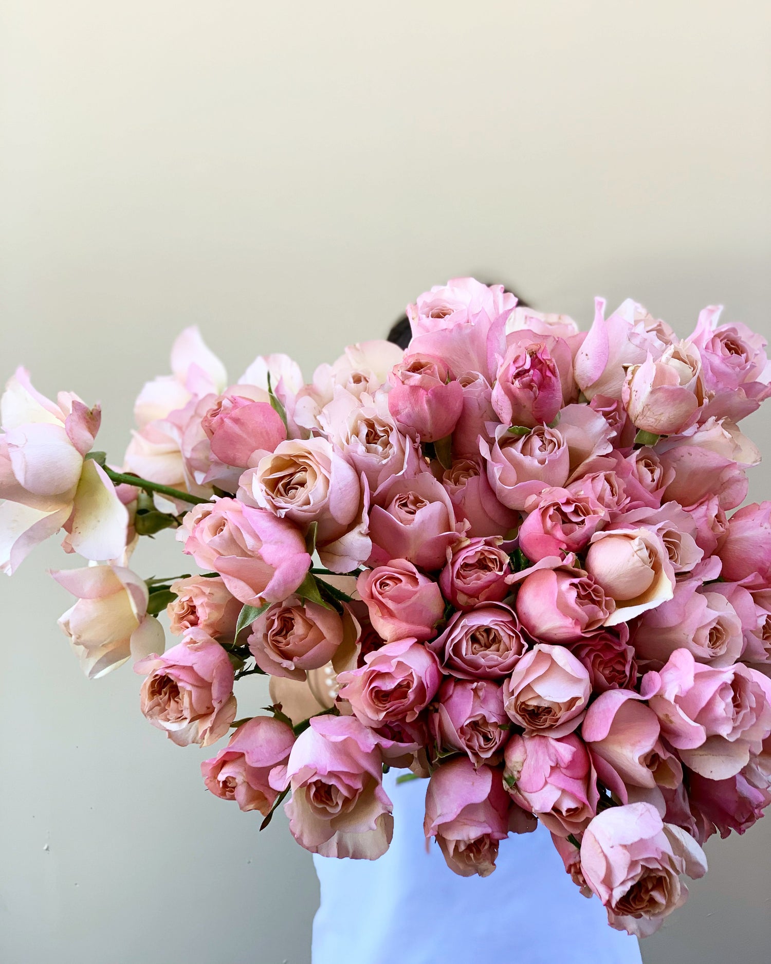 Rose bouquet in florist hands