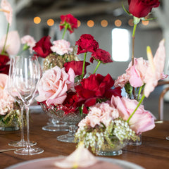 red and pink wedding table arrangement