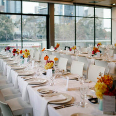 Wedding table arrangements on table at a venue in Melbourne