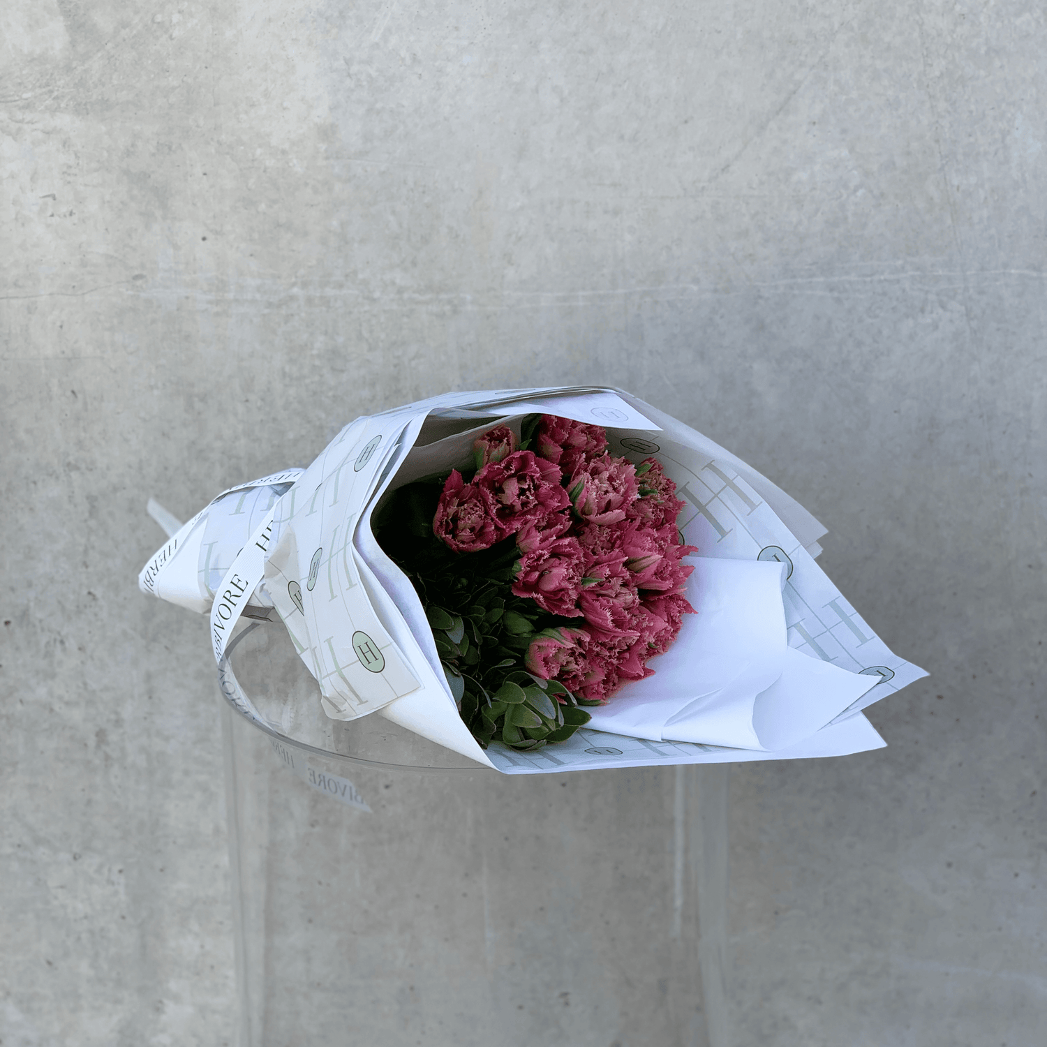 Large bouquet of pink tulips gift wrapped